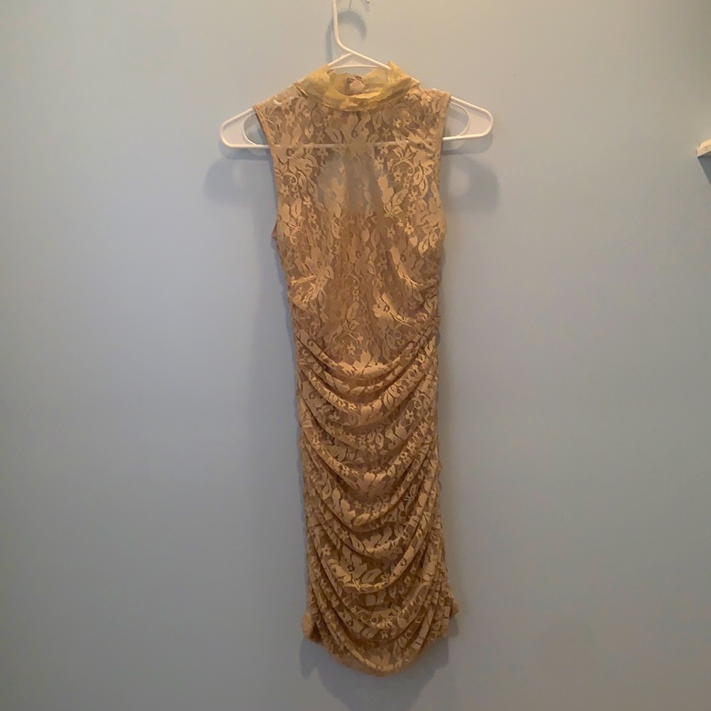 Small, tan Lacey dress, never worn, has tags